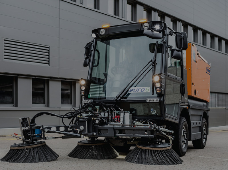 Compact sweeper